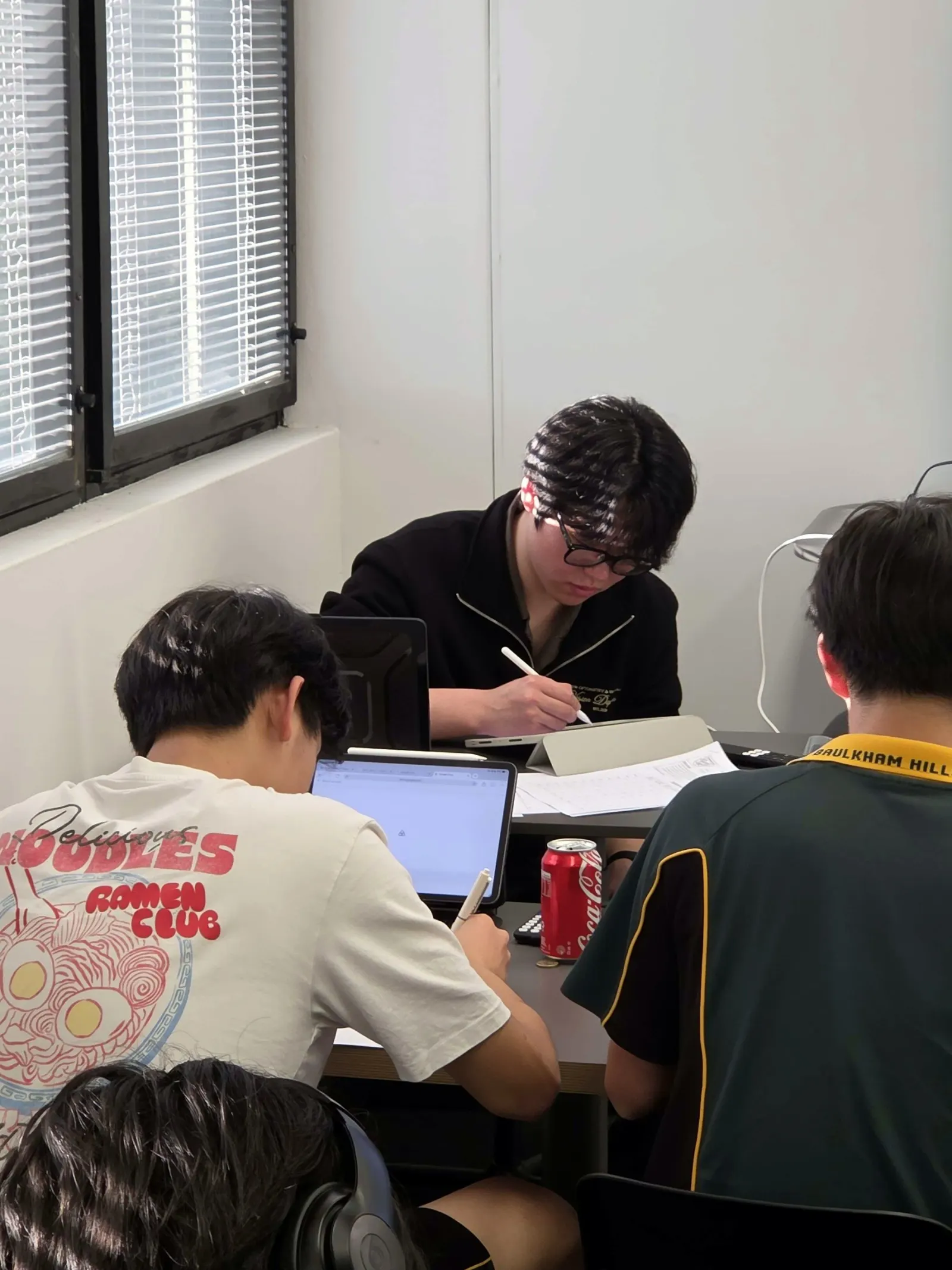 A BEAM tutor teaching from the classroom screen